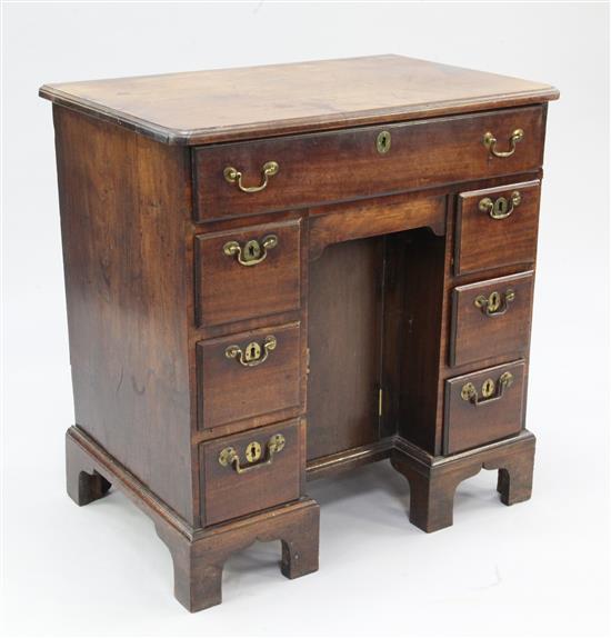 An 18th century mahogany kneehole desk, W.2ft 6in.